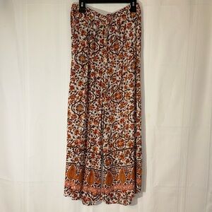 Wide leg elastic waist pants with pockets.